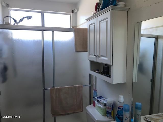 6405 Keystone Street Simi Valley, CA 93063 - Photo 8 of 17 a bathroom with a sink and a mirror