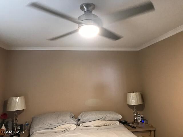 6405 Keystone Street Simi Valley, CA 93063 - Photo 9 of 17 a bedroom with a bed and a lamp on table