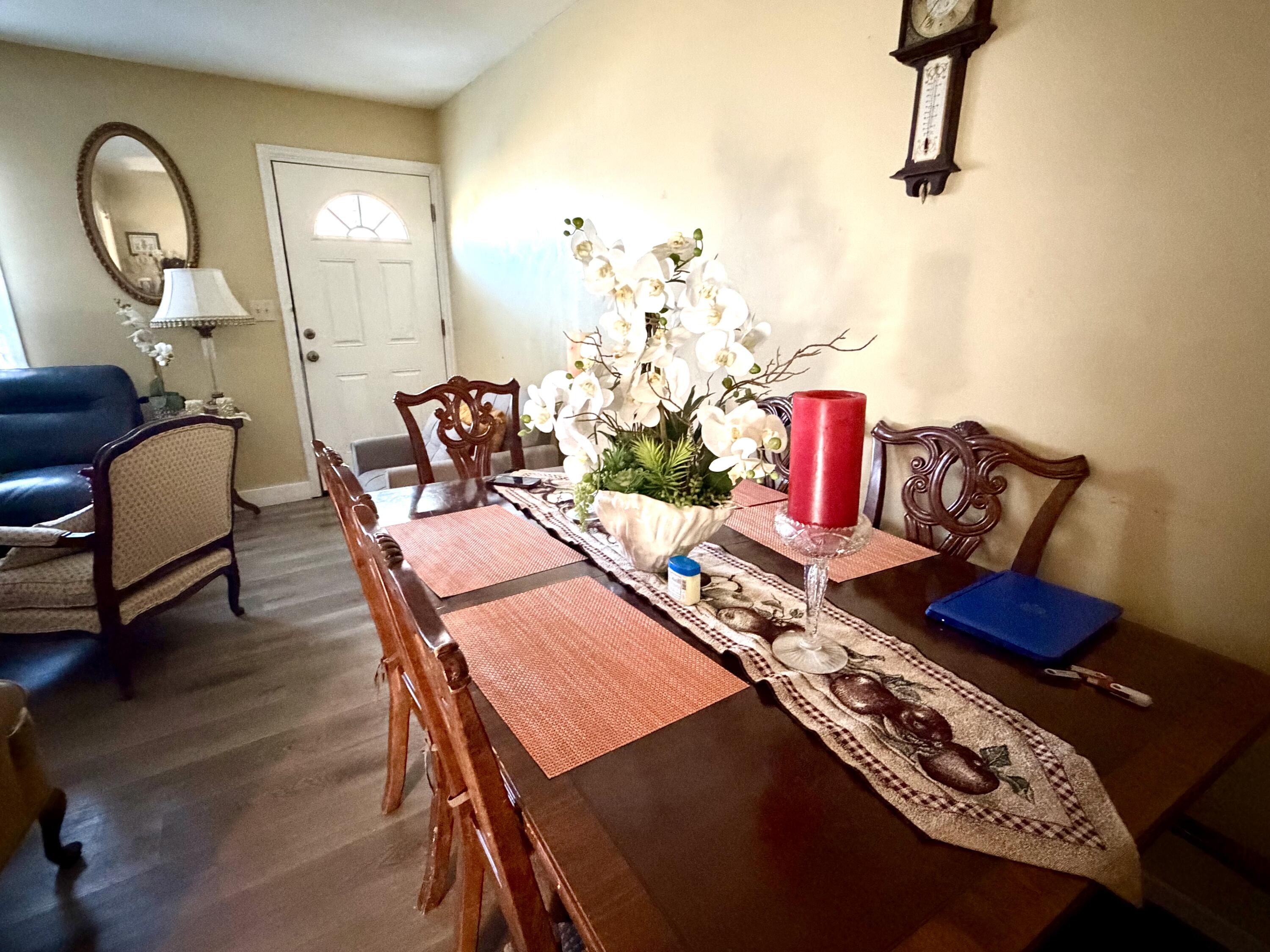 10 Hiramar Road, Unit 1012 Hyannis, MA 02601 - Photo 4 of 7 a living room with furniture