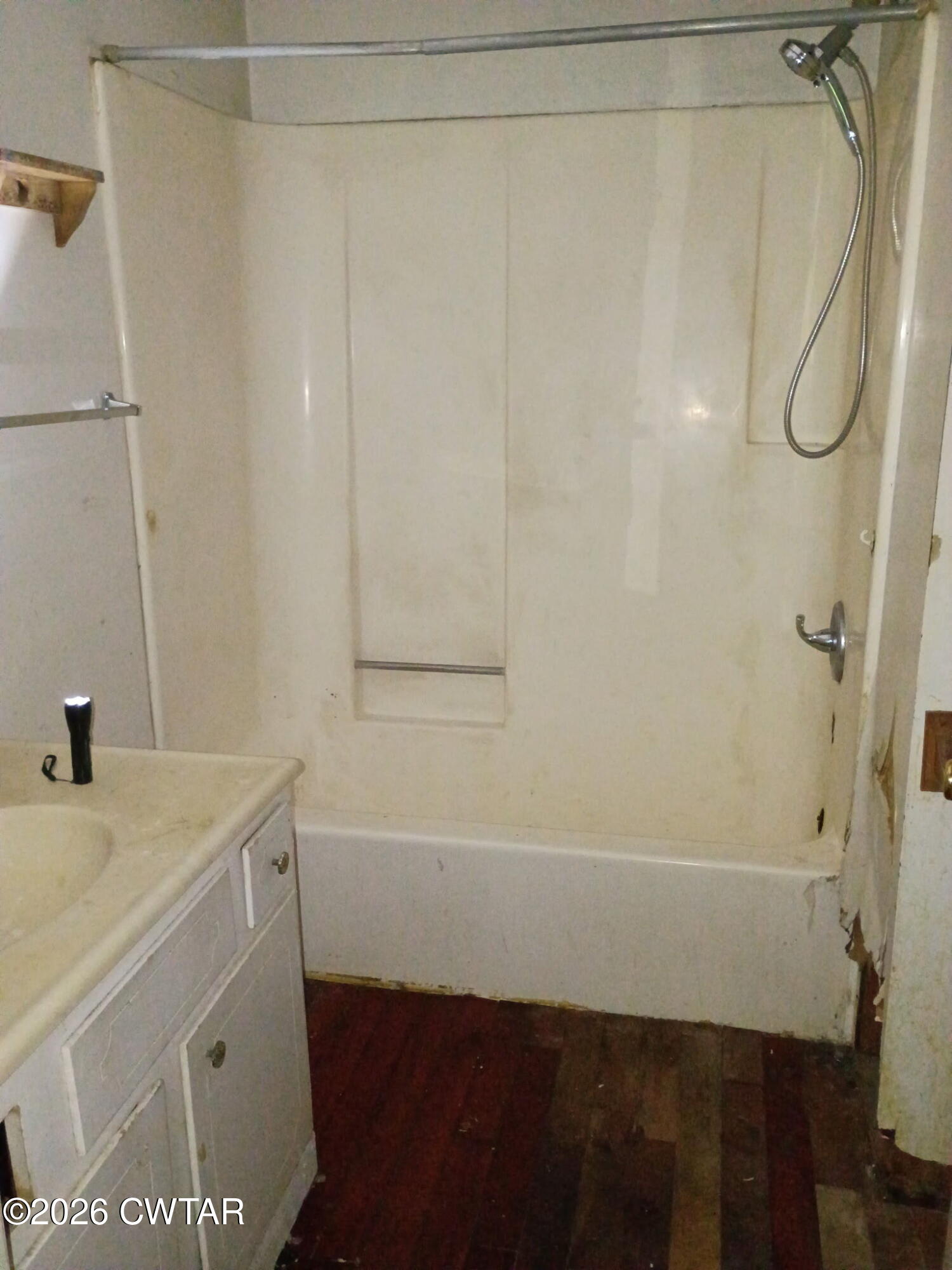 180 Dale Road Henry, TN 38231 - Photo 14 of 26 a bathroom with a sink and a shower