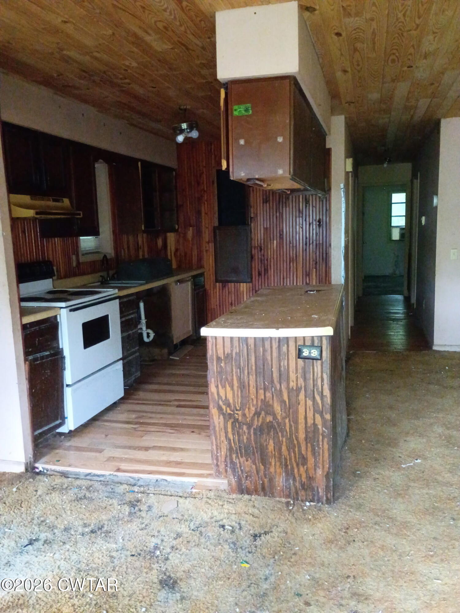 180 Dale Road Henry, TN 38231 - Photo 16 of 26 a kitchen with a sink and a stove