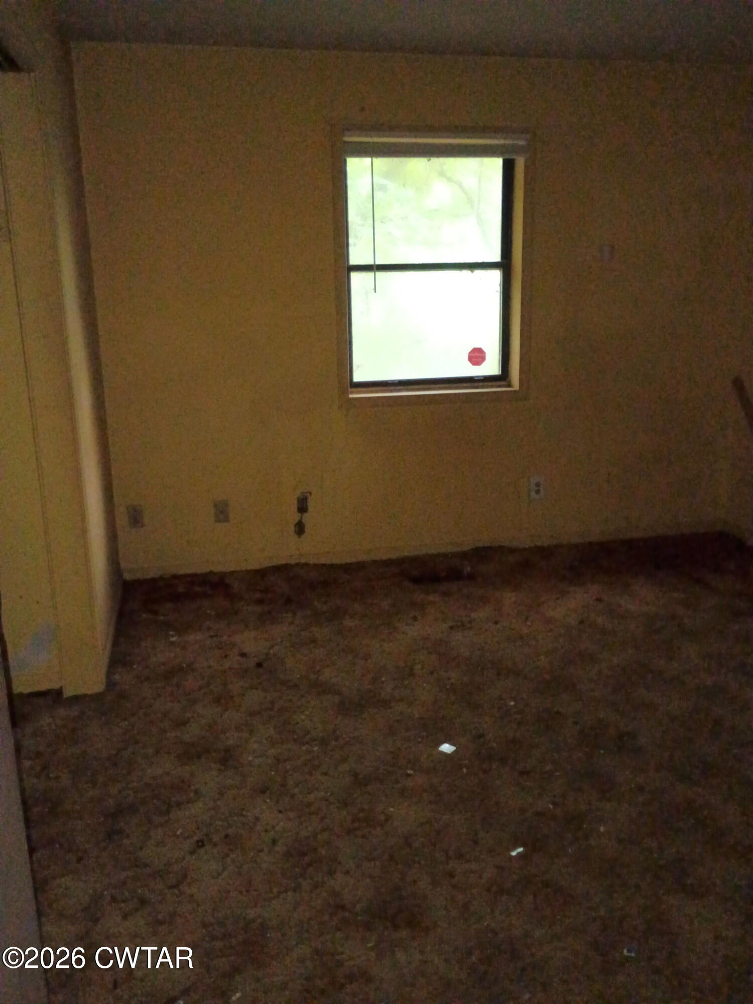 180 Dale Road Henry, TN 38231 - Photo 6 of 26 an empty room with a window