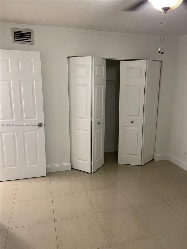 3955 North Nob Hill Road, Unit 101 Sunrise, FL 33351 - Photo 11 of 19 a view of an empty room