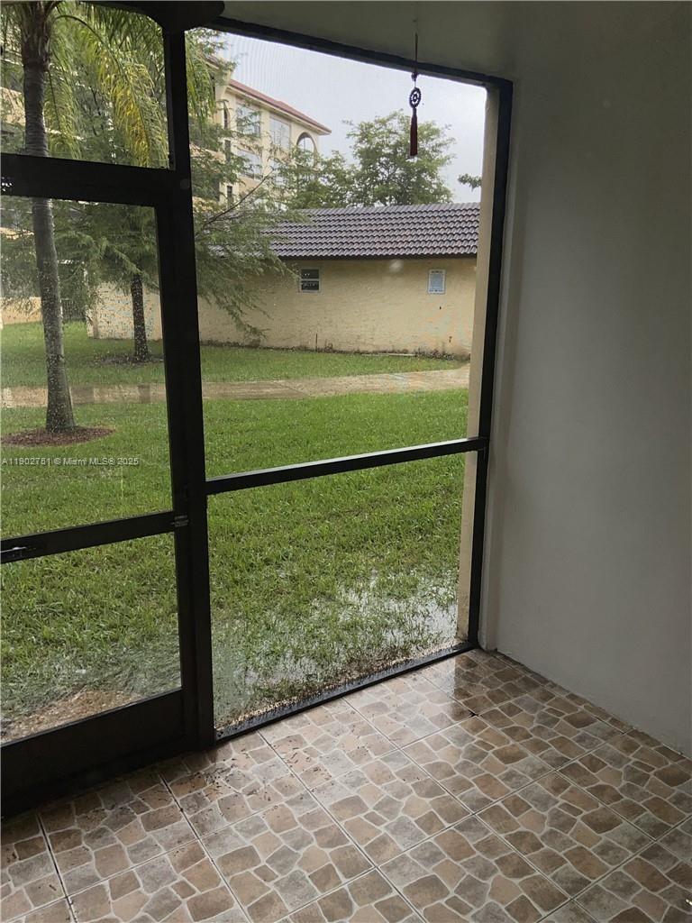 3955 North Nob Hill Road, Unit 101 Sunrise, FL 33351 - Photo 19 of 19 a view of a porch