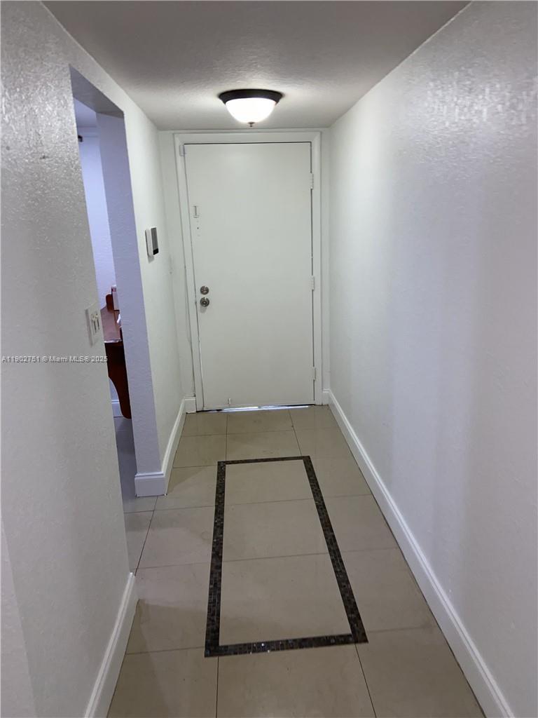 3955 North Nob Hill Road, Unit 101 Sunrise, FL 33351 - Photo 3 of 19 a bathroom with a tub and shower