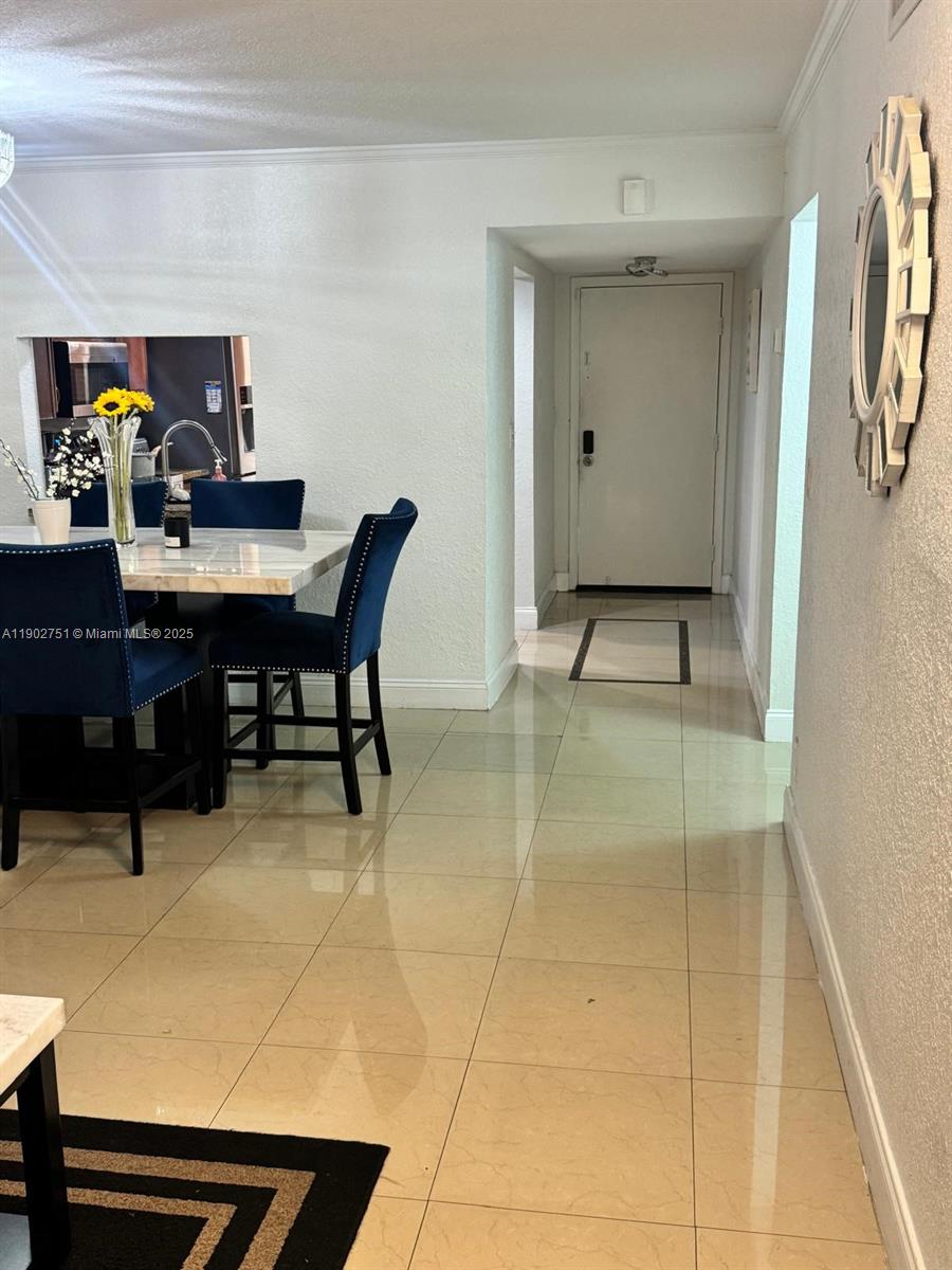 3955 North Nob Hill Road, Unit 101 Sunrise, FL 33351 - Photo 6 of 19 a view of a workspace with furniture