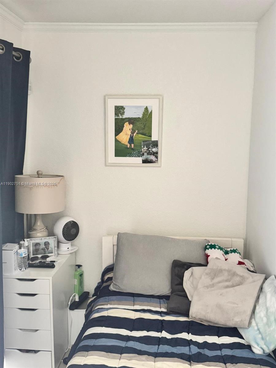 3955 North Nob Hill Road, Unit 101 Sunrise, FL 33351 - Photo 8 of 19 a bathroom with a sink and a mirror