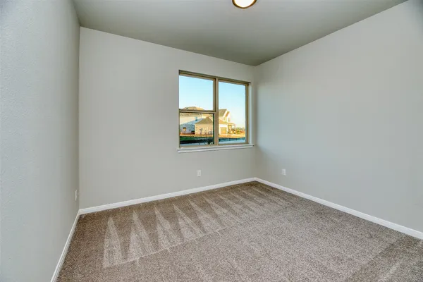 an empty room with window