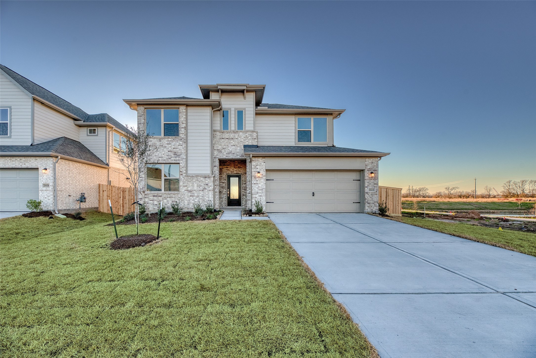 21122 Sunlight Grv Drive Rosharon, TX 77583 - Photo 37 of 45 a front view of a house with garden