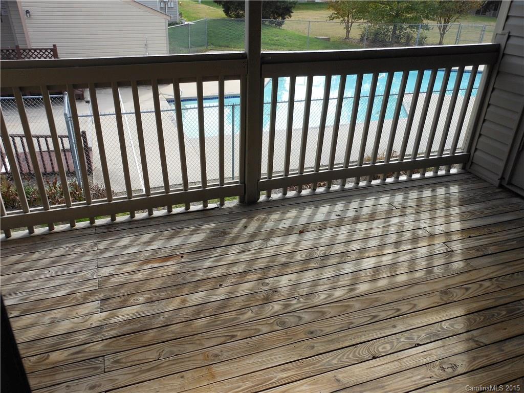 11054 Running Ridge Road, Unit 8415 Charlotte, NC 28226 - Photo 17 of 24 a view of outdoor space with deck
