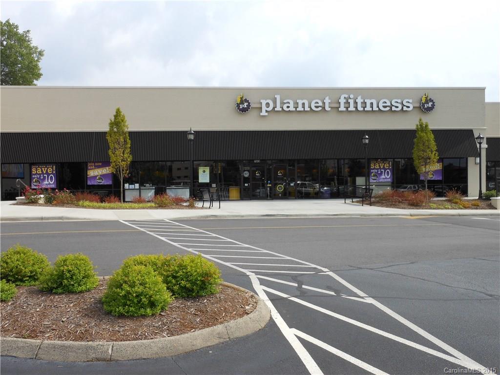 11054 Running Ridge Road, Unit 8415 Charlotte, NC 28226 - Photo 23 of 24 a view of a building with a street