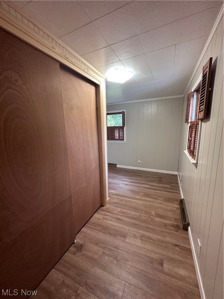 3019 West Poplar Ridge Road Malta, OH 43758 - Photo 7 of 17 Hallway, light hardwood floors