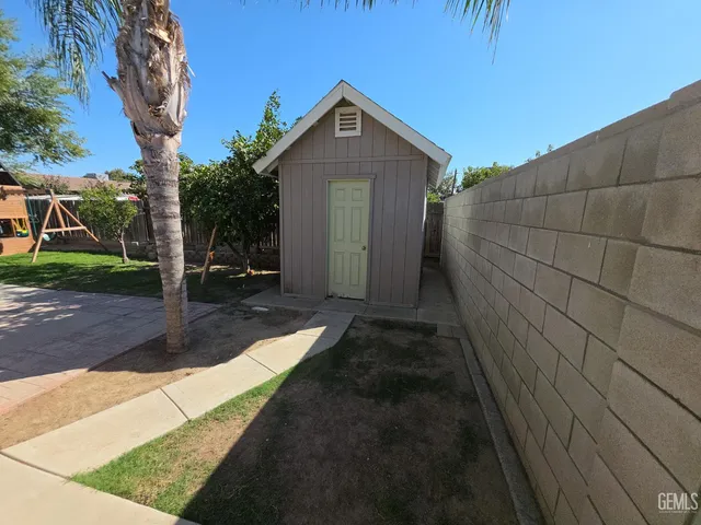 a view of house with backyard porch and entertaining space