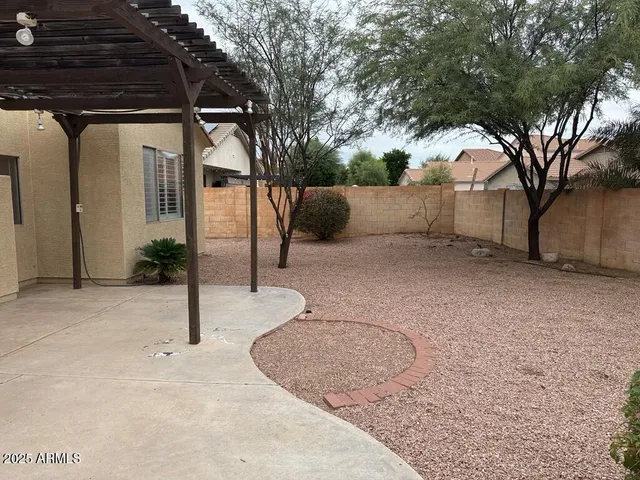a view of a house with a snow in the yard
