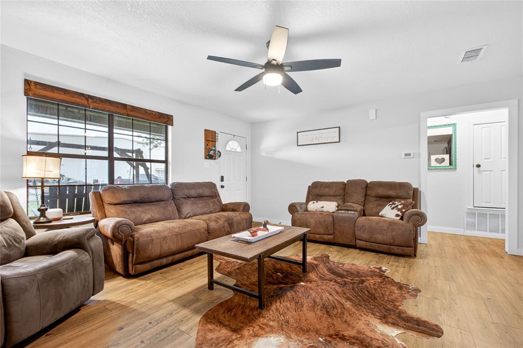 703 College Street Celeste, TX 75423 - Photo 9 of 29 a living room with furniture and a window