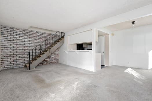 5940 Birch Street, Unit 2 Carpinteria, CA 93013 - Photo 5 of 17 a view of an empty room with stairs
