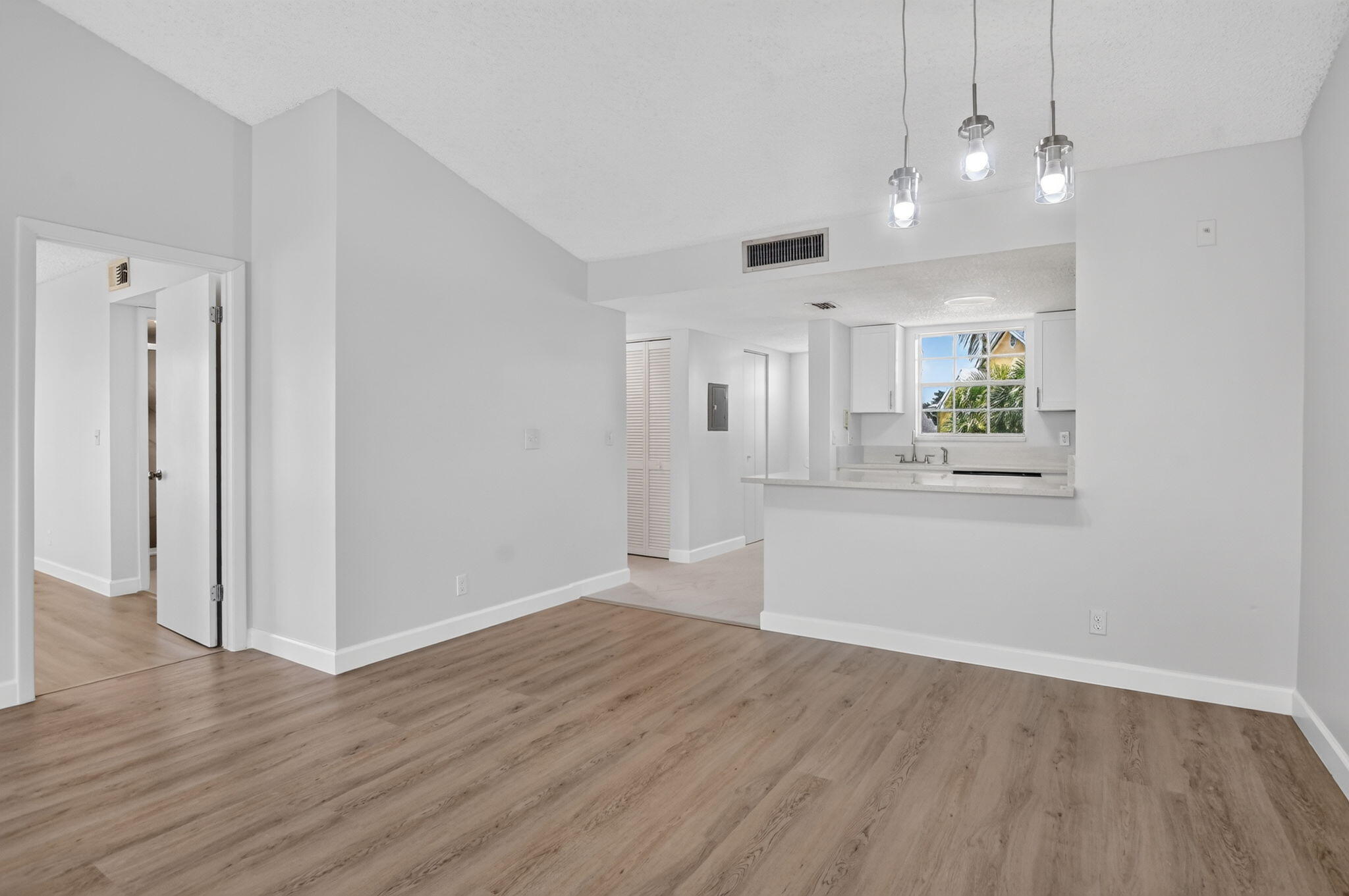 6323 La Costa Drive, Unit M Boca Raton, FL 33433 - Photo 10 of 33 living/kitchen