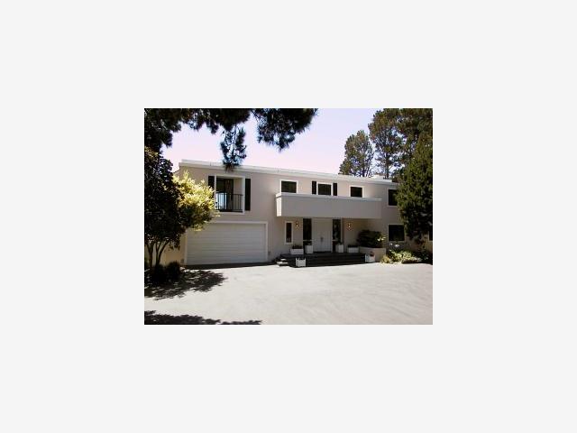 1468 Riata Road Pebble Beach, CA 93953 - Photo 1 of 1 a picture of a living room with a couch