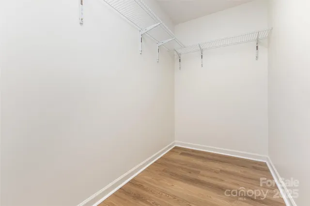 a view of small space with wooden floor