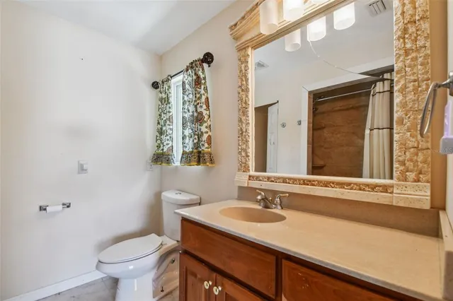 a bathroom with a sink and a toilet