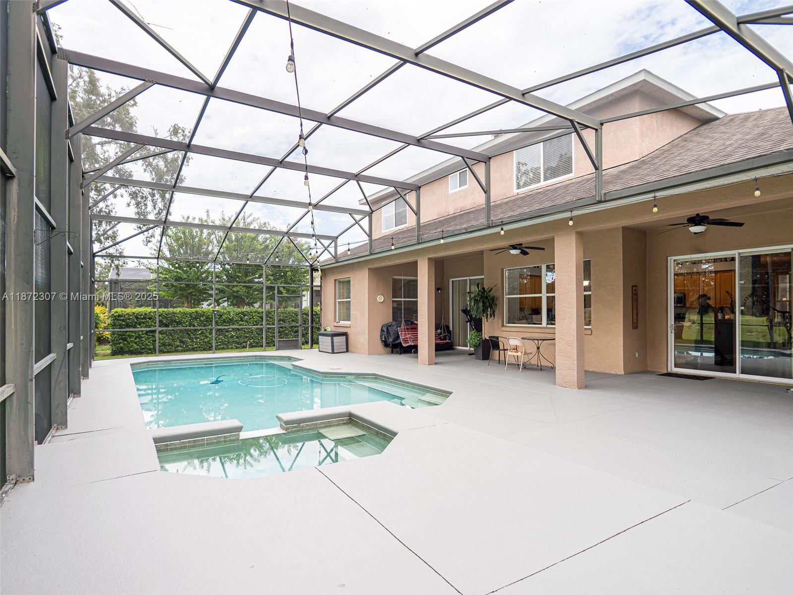 565 Hebrides Court Apopka, FL 32712 - Photo 25 of 32 a view of a house with pool table and chairs