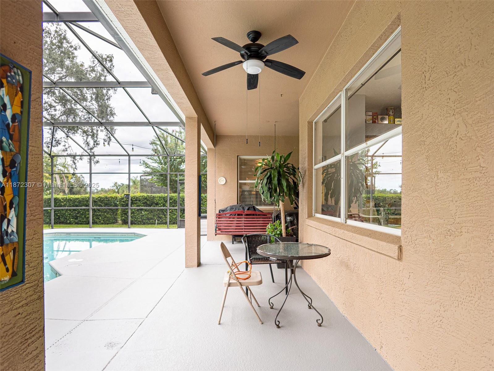 565 Hebrides Court Apopka, FL 32712 - Photo 27 of 32 a living room with furniture and a window