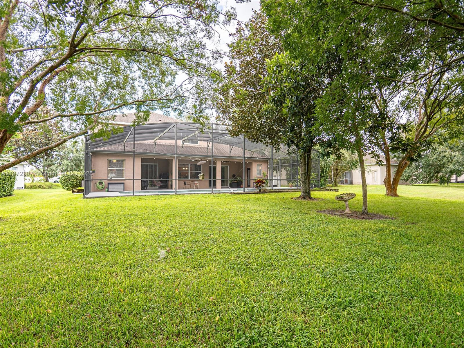 565 Hebrides Court Apopka, FL 32712 - Photo 31 of 32 a front view of house with yard and green space