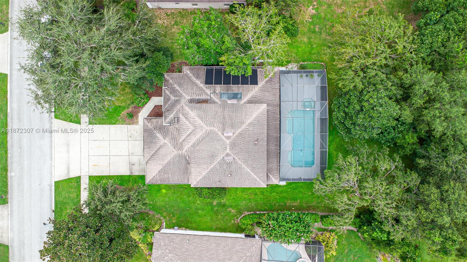 565 Hebrides Court Apopka, FL 32712 - Photo 4 of 32 an aerial view of a house with a yard and garden