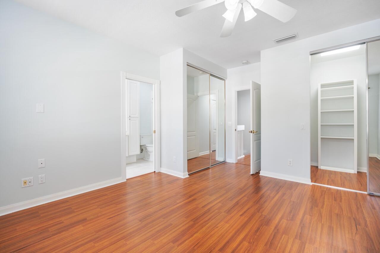 329 Legare Court Jupiter, FL 33458 - Photo 9 of 23 an empty room with wooden floor