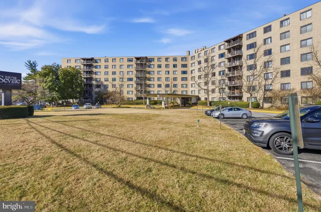 a building with trees in front of it