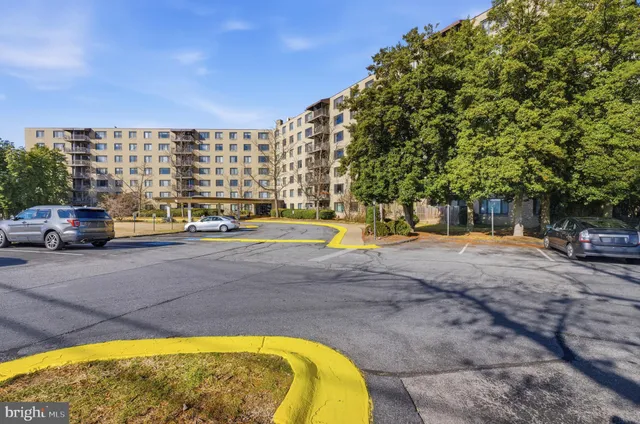 a swimming pool with outdoor seating and yard