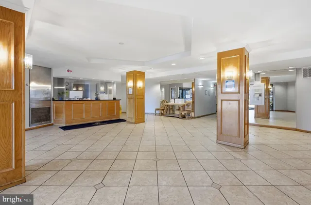 a view of a living room with a large window