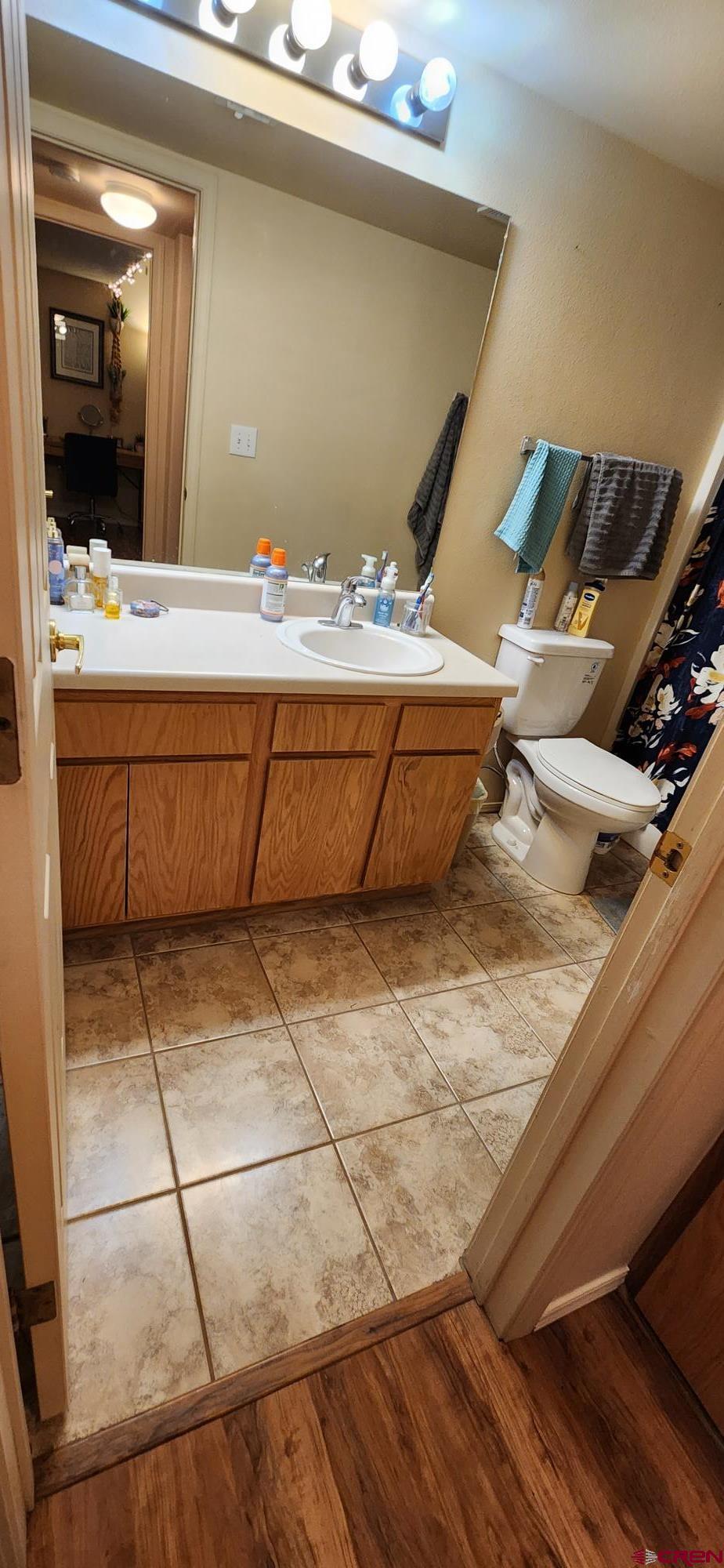 1100 Goeglein Gulch Road, Unit 162 Durango, CO 81301 - Photo 14 of 34 a bathroom with a sink and a mirror