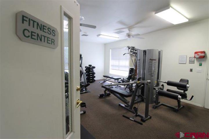 1100 Goeglein Gulch Road, Unit 162 Durango, CO 81301 - Photo 33 of 34 a view of a livingroom with workspace and a window