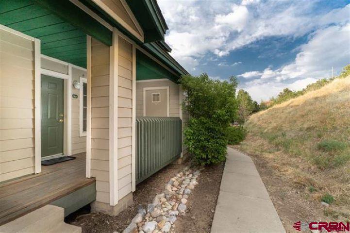 1100 Goeglein Gulch Road, Unit 162 Durango, CO 81301 - Photo 34 of 34 a view of a pathway along the house