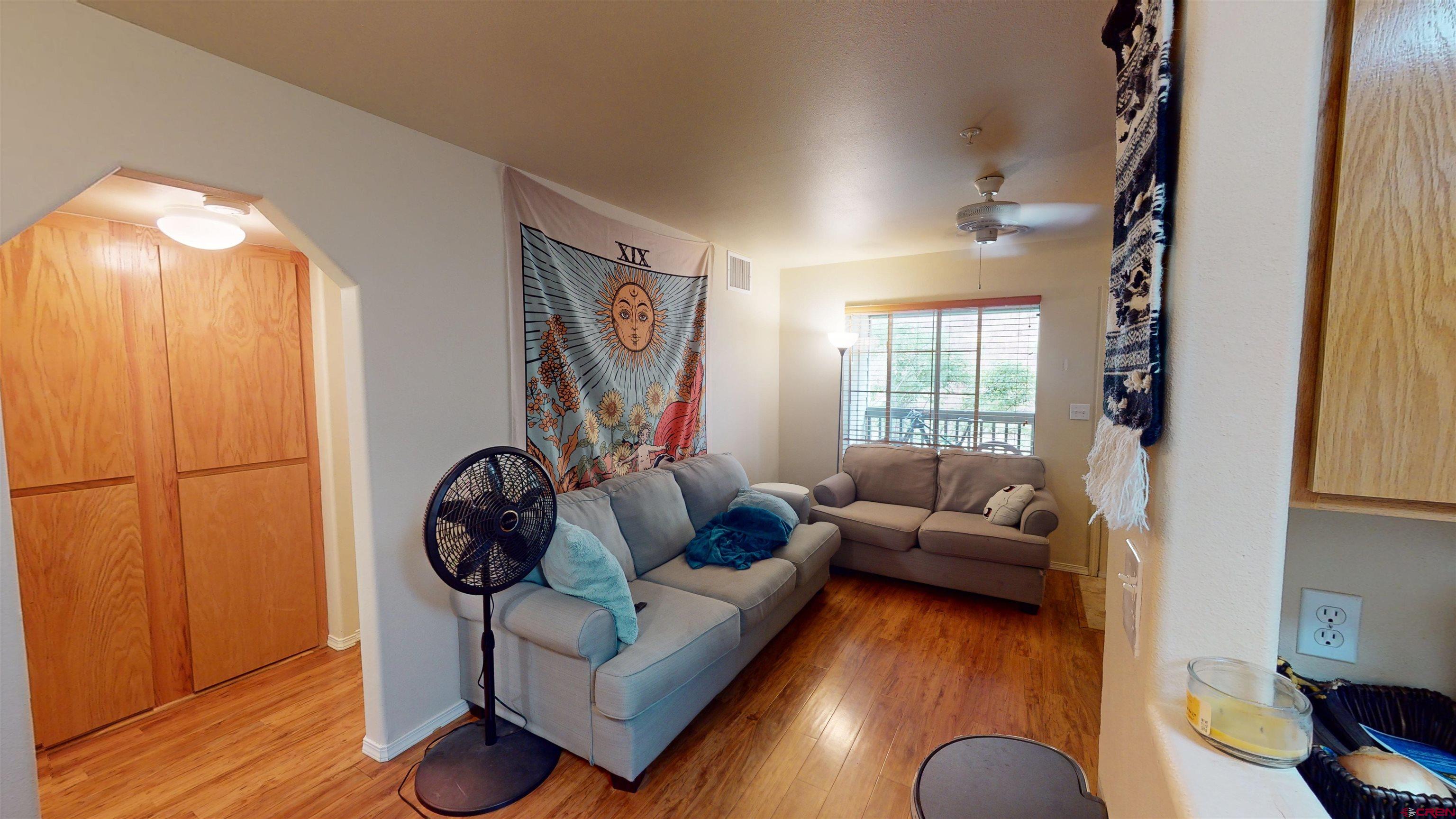 1100 Goeglein Gulch Road, Unit 162 Durango, CO 81301 - Photo 4 of 34 a living room with furniture and a window
