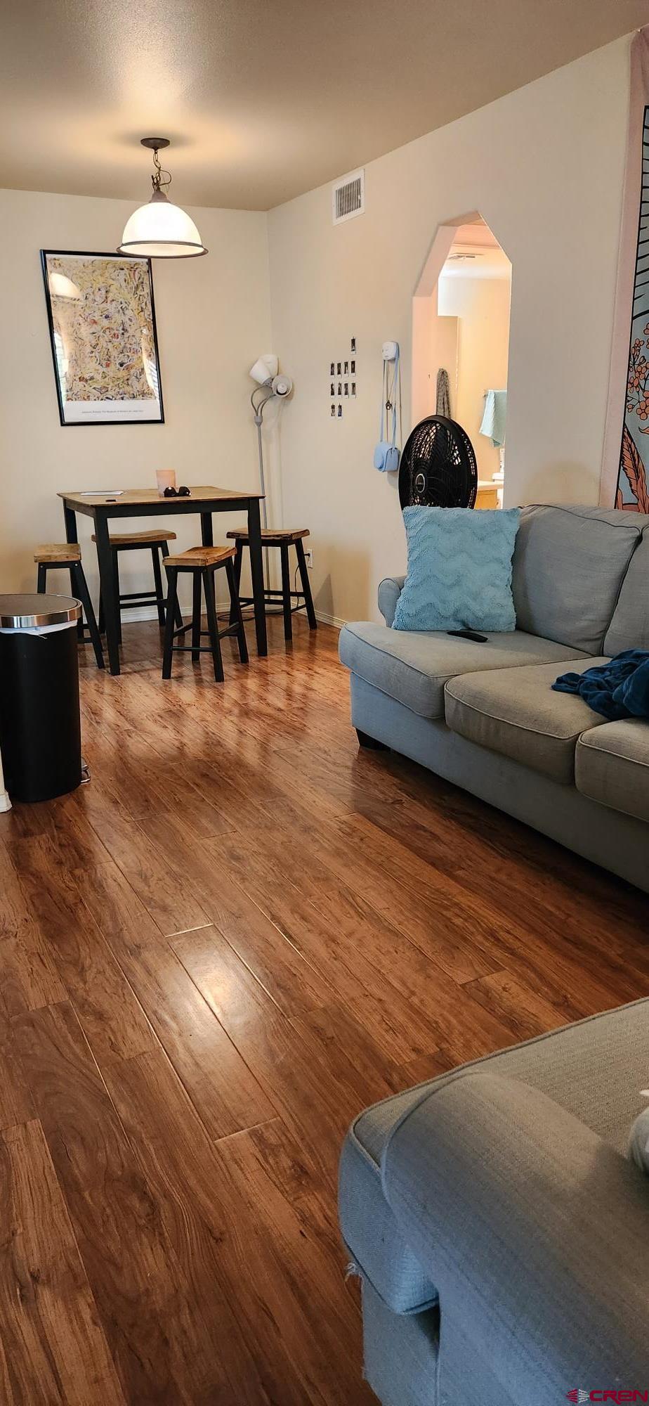 1100 Goeglein Gulch Road, Unit 162 Durango, CO 81301 - Photo 6 of 34 a living room with furniture and a wooden floor