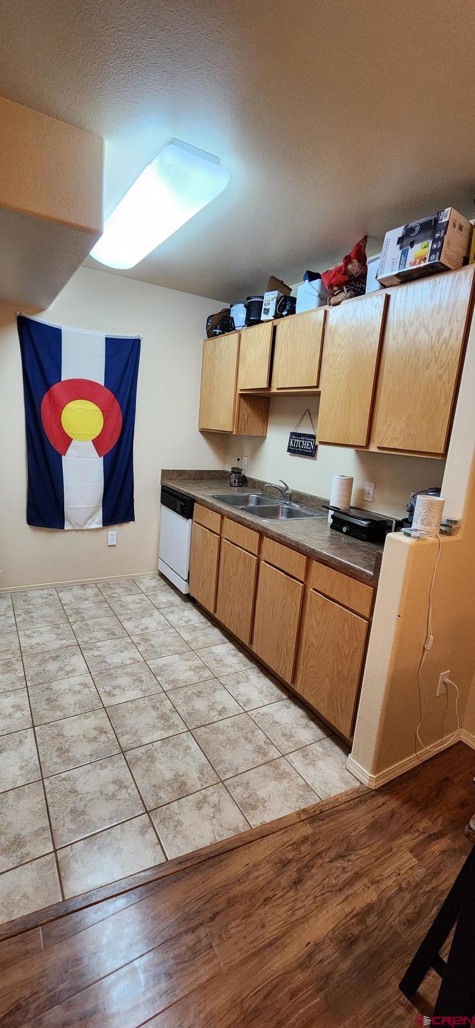 1100 Goeglein Gulch Road, Unit 162 Durango, CO 81301 - Photo 8 of 34 a bedroom with a bed and dresser