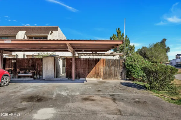 a view of a car park in front of a building