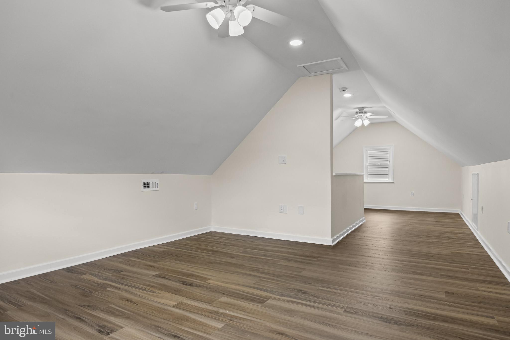 937 Clements Bridge Road Barrington, NJ 08007 - Photo 30 of 34 wooden floor in an empty room with a window