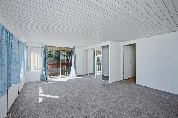 a view of a livingroom with a large window