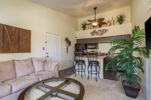 a view of a dining room with furniture