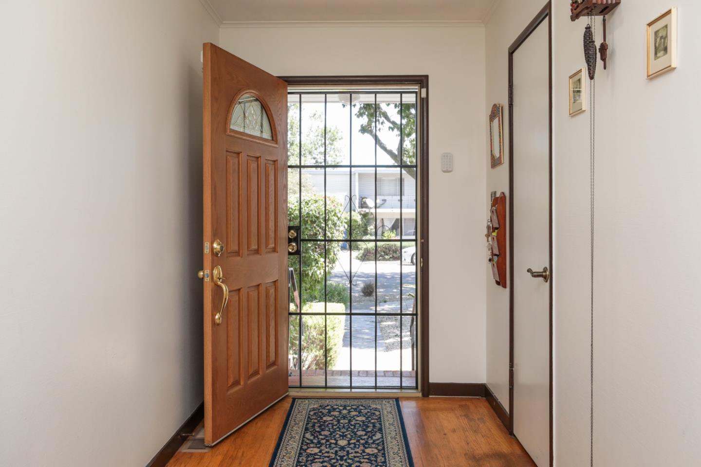 443 Dwight Road Burlingame, CA 94010 - Photo 3 of 28 a view of hallway with a window