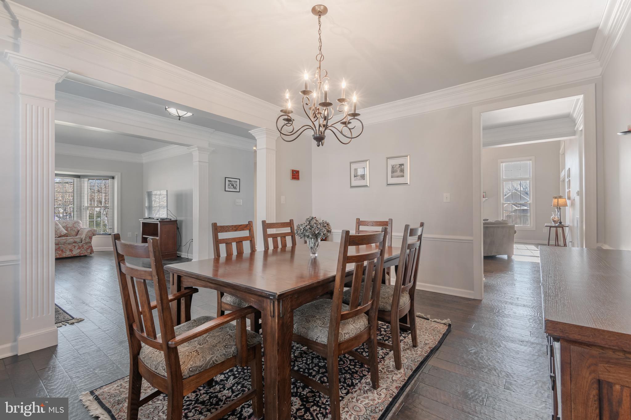 12911 Buckeye Drive North Potomac, MD 20878 - Photo 30 of 74 a view of a dining room with furniture and wooden floor