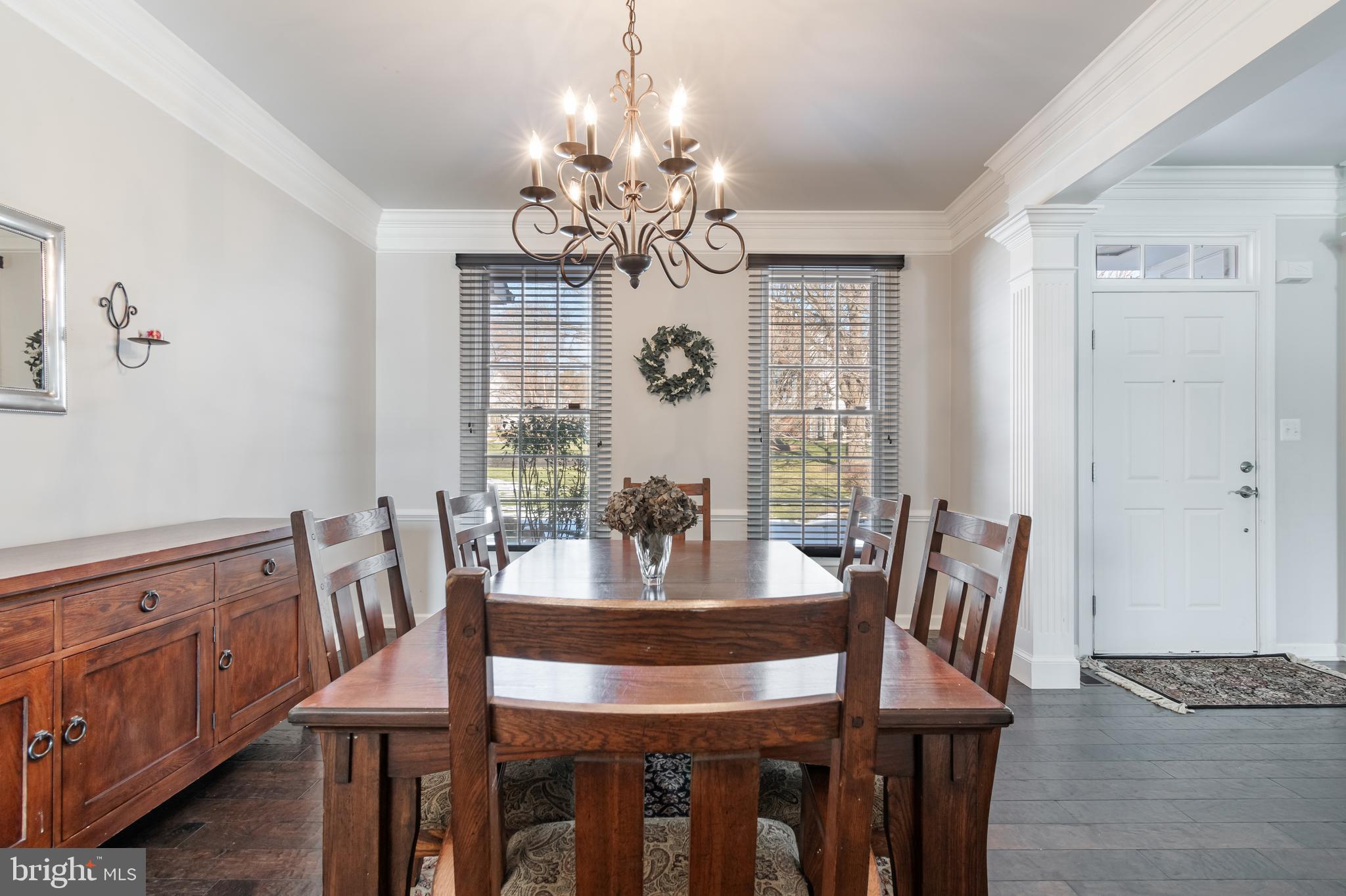 12911 Buckeye Drive North Potomac, MD 20878 - Photo 31 of 74 a view of a dining room with furniture window and wooden floor