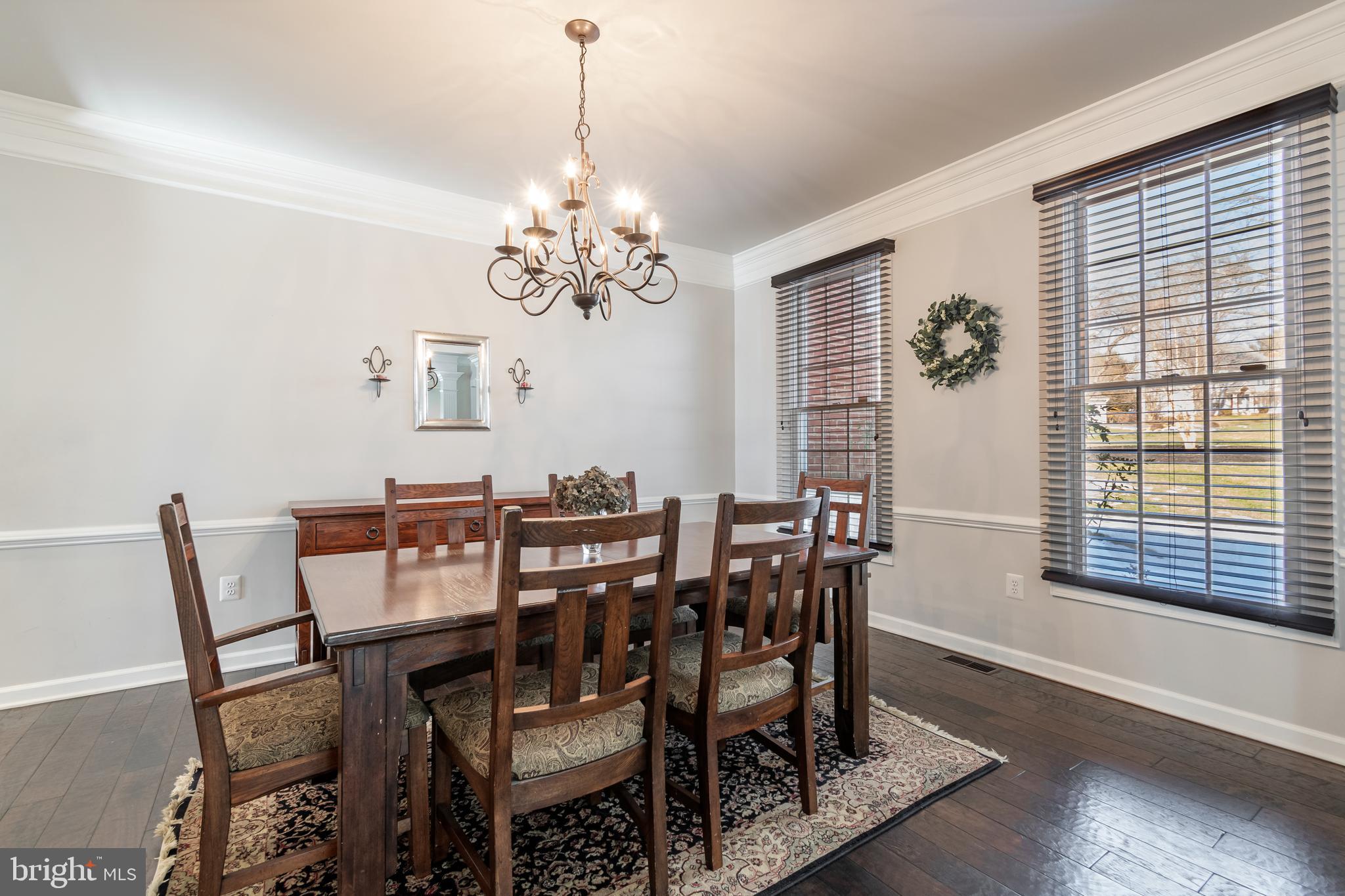 12911 Buckeye Drive North Potomac, MD 20878 - Photo 33 of 74 a view of a dining room with furniture window and wooden floor