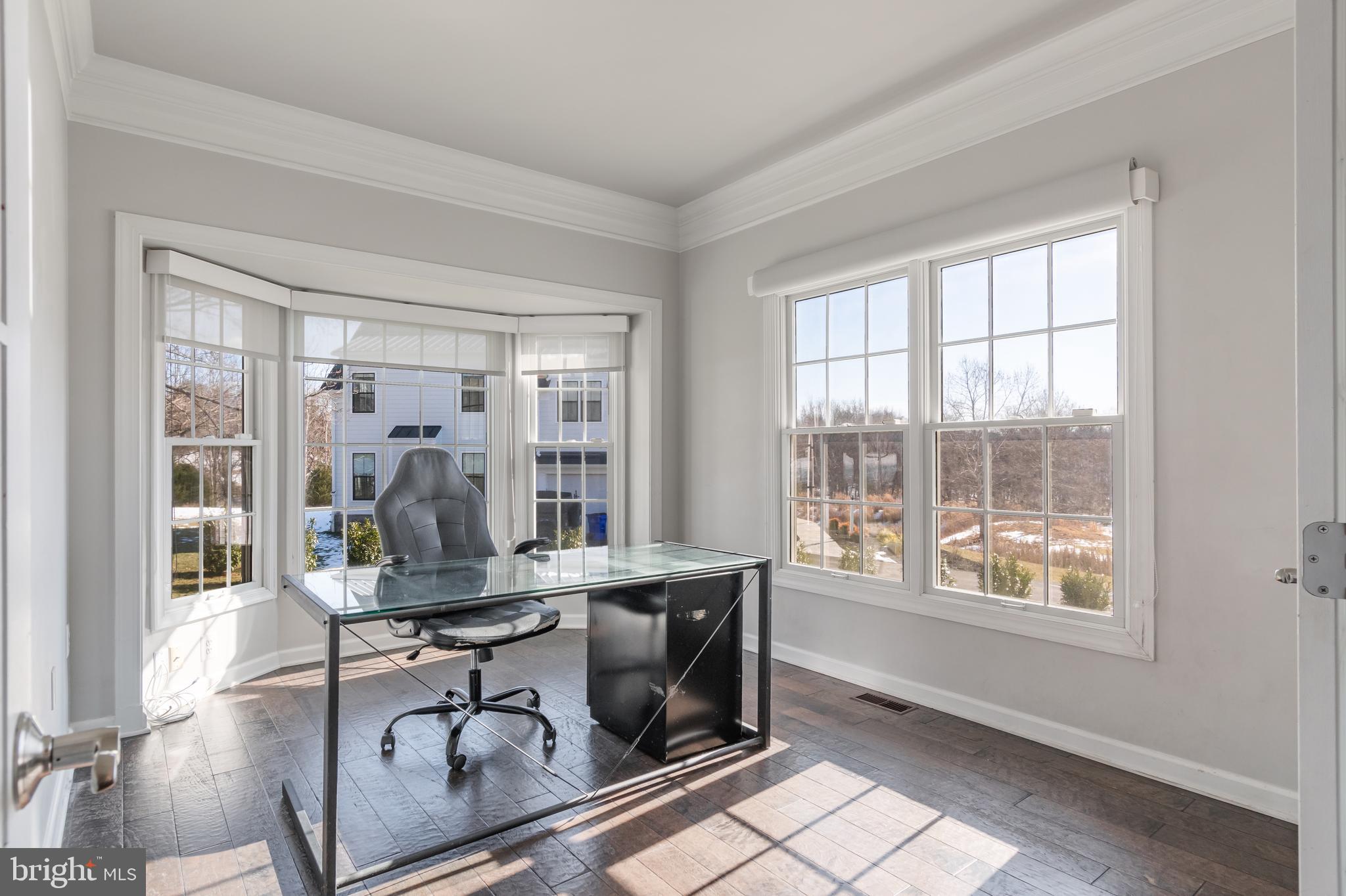 12911 Buckeye Drive North Potomac, MD 20878 - Photo 34 of 74 a workspace with wooden floor and a window