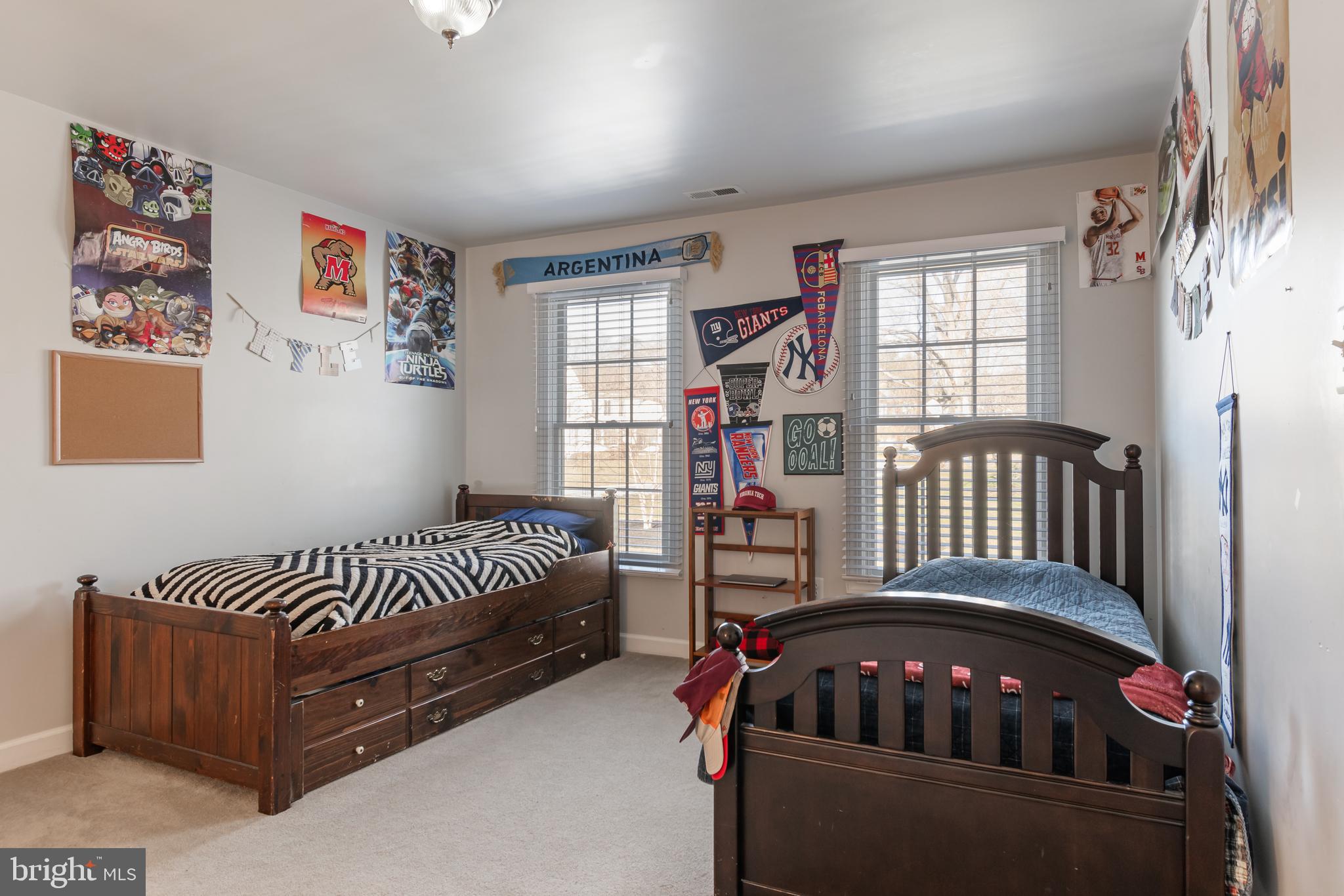 12911 Buckeye Drive North Potomac, MD 20878 - Photo 49 of 74 a bedroom with furniture and a window