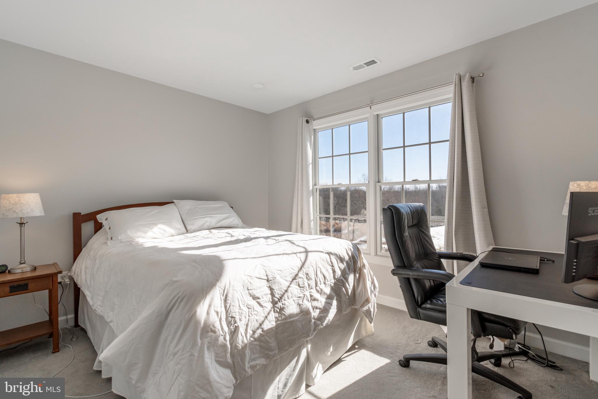 12911 Buckeye Drive North Potomac, MD 20878 - Photo 52 of 74 a bedroom with a bed and a desk