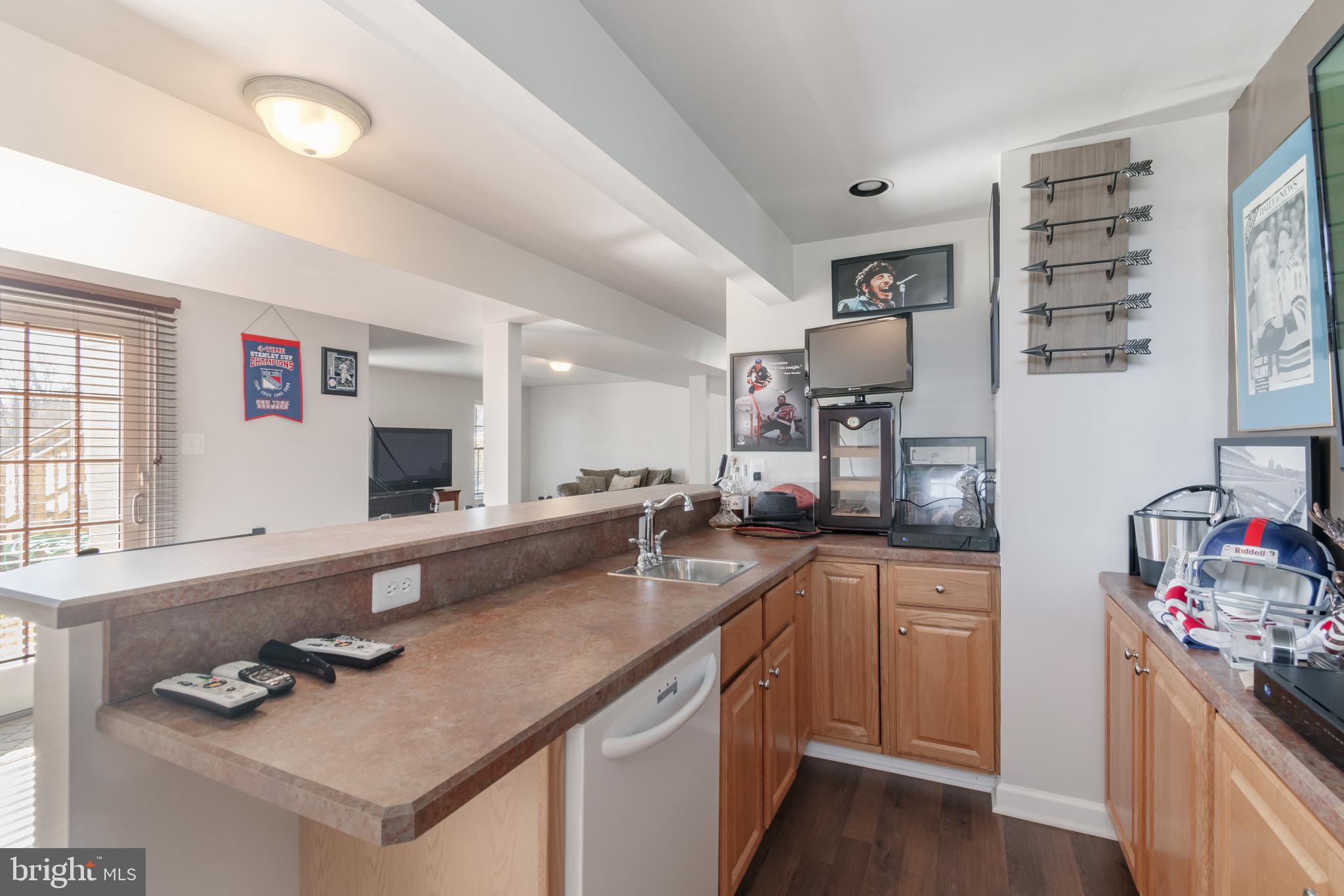 12911 Buckeye Drive North Potomac, MD 20878 - Photo 60 of 74 a kitchen with granite countertop a sink stove and cabinets